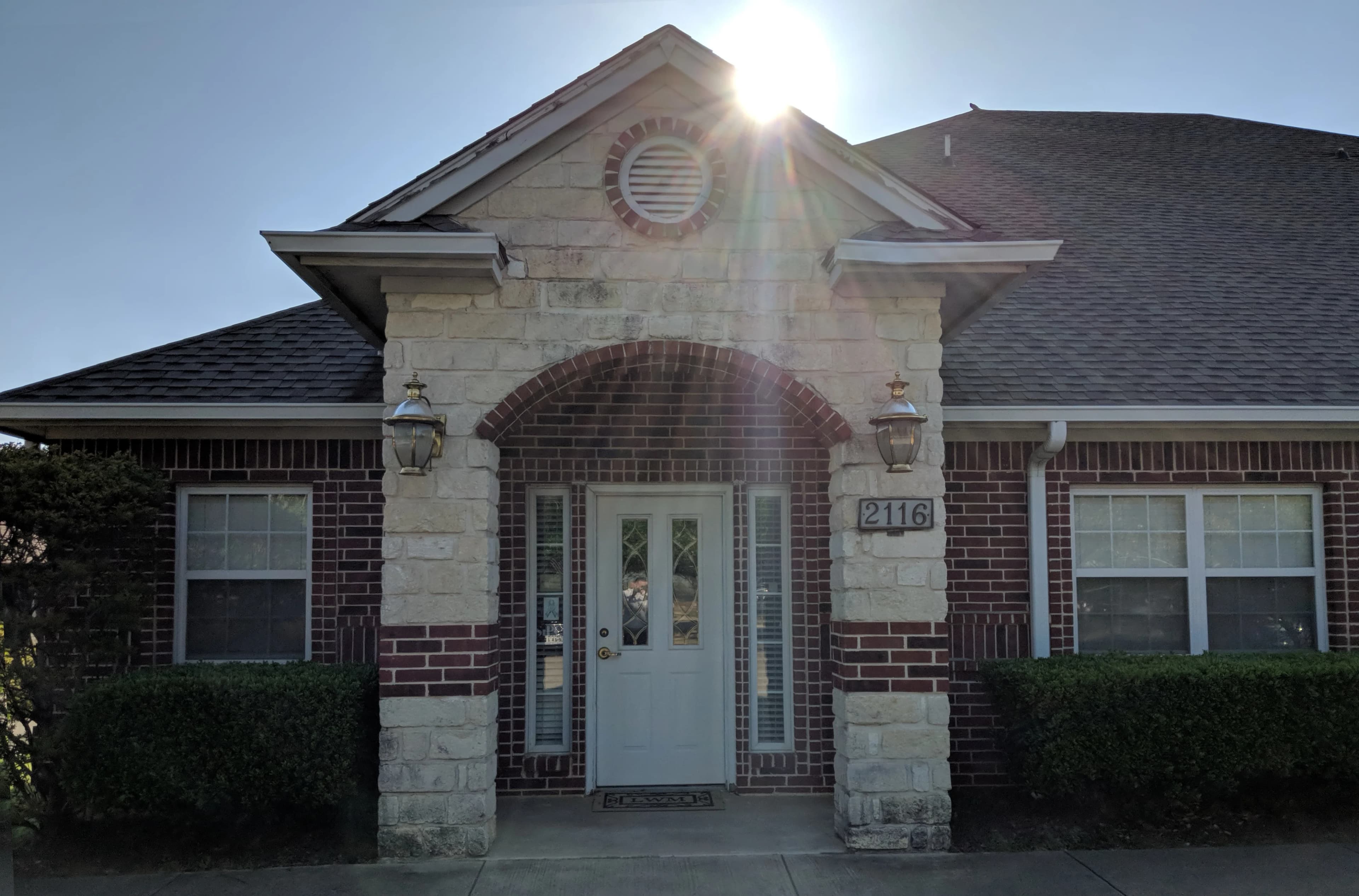The front entrance of Lorio Wealth Management at 2116 Parkwood Drive